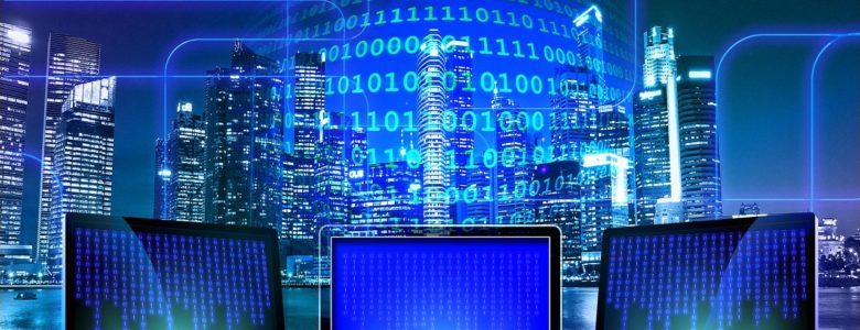 Cyber attack defense: three monitors run code with a high-tech holograph of binary digits in the background