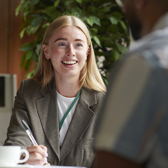 Woman working with the insured workforce development programs 