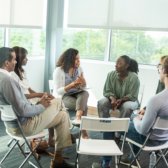Adult support group in circle during support group session