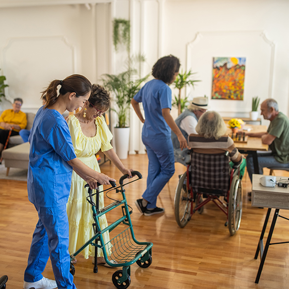 Senior care facility showing room with many activities happening